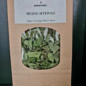 Sachet en papier kraft avec une fenêtre transparente laissant apparaitre la mélisse sèche